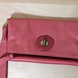 Coach pink leather resort clutch